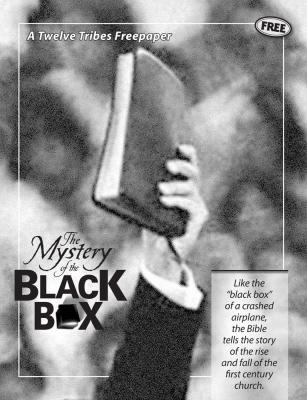 Man's hand holding up a large black bible